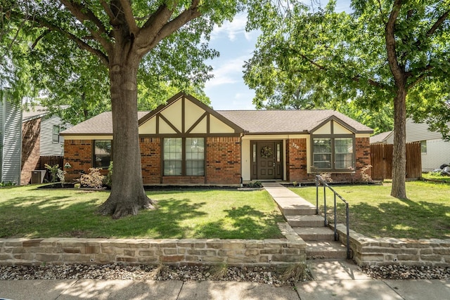 220 Timber Ridge Ln, Coppell, TX 75019 - tudor house with brick siding and a shingled roof