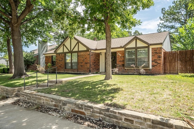 220 Timber Ridge Ln, Coppell, TX 75019 - english style home featuring brick siding and a chimney