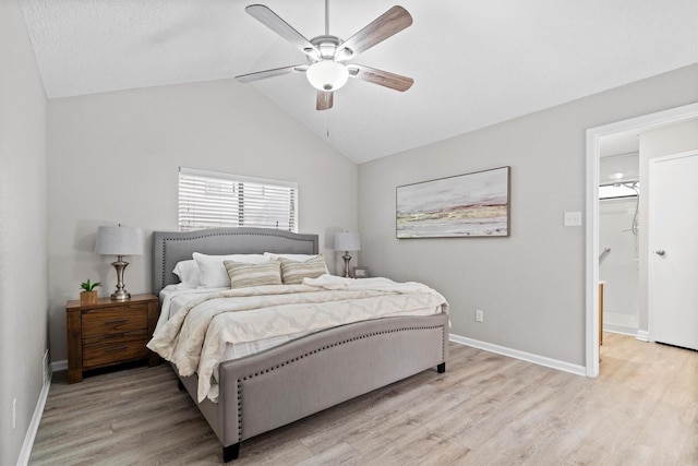 220 Timber Ridge Ln, Coppell, TX 75019 - bedroom featuring light wood-style flooring, baseboards, vaulted ceiling, and ceiling fan