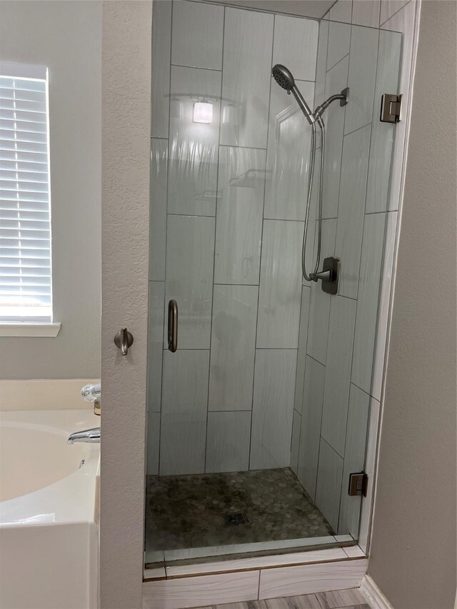 2020 Southwood Trl, Grand Prairie, TX 75052 - full bathroom with a shower stall and a garden tub