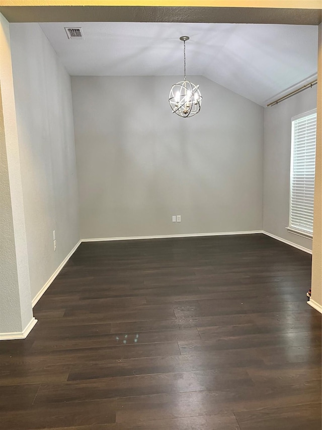 2020 Southwood Trl, Grand Prairie, TX 75052 - empty room featuring vaulted ceiling, dark wood finished floors, baseboards, and a chandelier