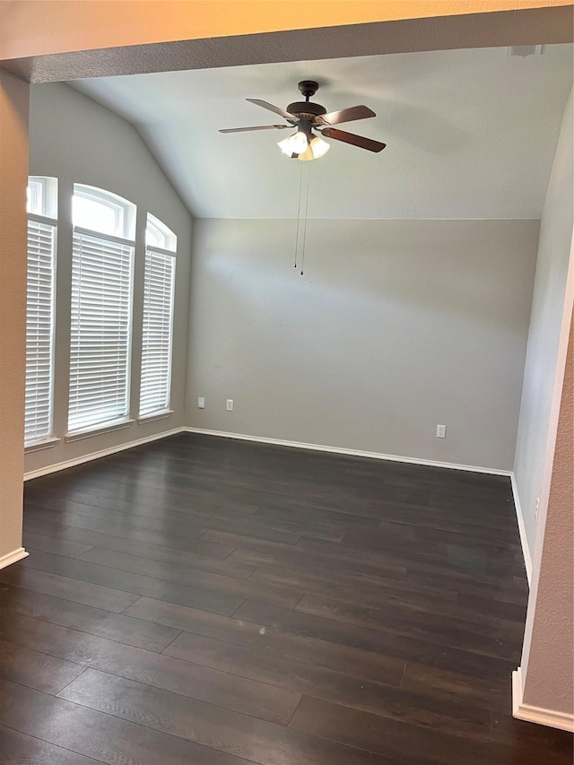 2020 Southwood Trl, Grand Prairie, TX 75052 - unfurnished room with vaulted ceiling, dark wood-style floors, a ceiling fan, and baseboards