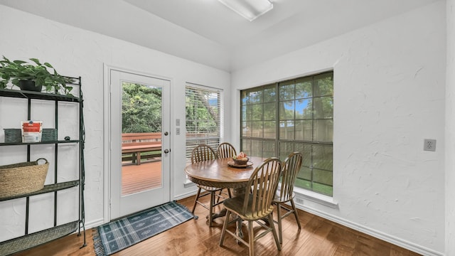 120 Oak Hollow Ct S, Azle, TX 76020 - dining room with vaulted ceiling, baseboards, and wood finished floors