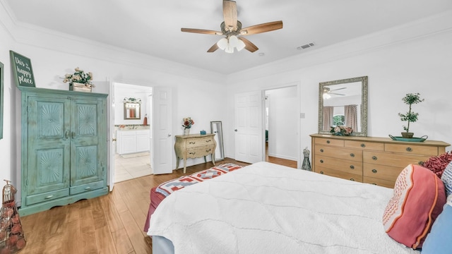 120 Oak Hollow Ct S, Azle, TX 76020 - bedroom featuring wood finished floors, ensuite bathroom, ornamental molding, and a ceiling fan