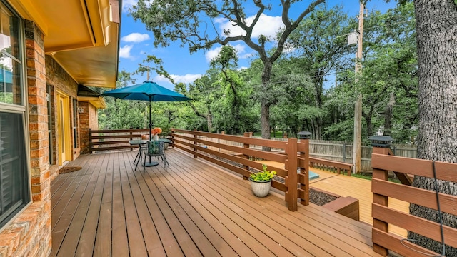120 Oak Hollow Ct S, Azle, TX 76020 - deck featuring outdoor dining area and view of scattered trees