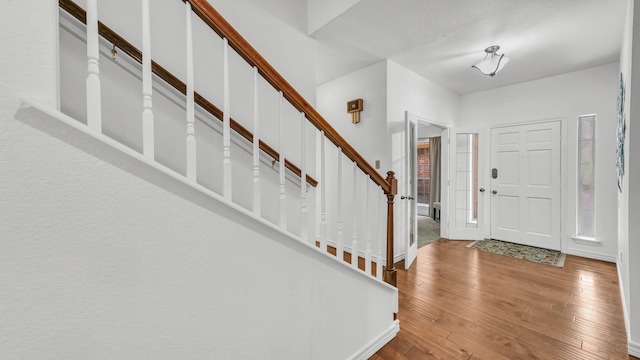 120 Oak Hollow Ct S, Azle, TX 76020 - entrance foyer featuring wood-type flooring, stairs, and baseboards