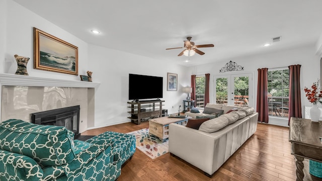 120 Oak Hollow Ct S, Azle, TX 76020 - living area featuring ceiling fan, recessed lighting, wood finished floors, a premium fireplace, and french doors