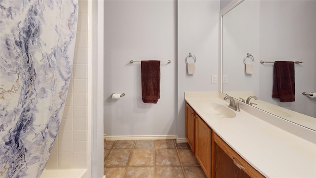 2801 Hereford Rd, Denton, TX 76210 - full bath with vanity, baseboards, and a shower with shower curtain