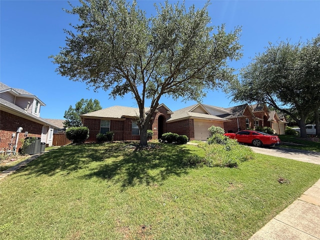 2801 Hereford Rd, Denton, TX 76210 - view of front of property with brick siding, a garage, a front yard, and driveway