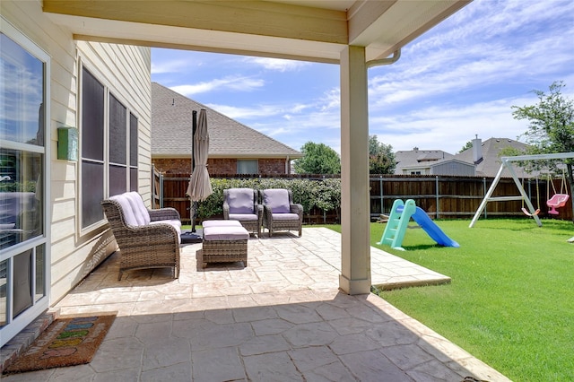 4028 Burwood Dr, Fort Worth, TX 76262 - view of patio featuring a playground and an outdoor living space