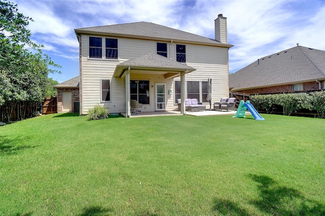 4028 Burwood Dr, Fort Worth, TX 76262 - rear view of house with a chimney, a patio, and an outdoor living space