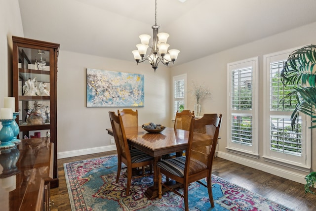 4328 Waterstone Rd, Fort Worth, TX 76244 - dining area featuring a chandelier, dark wood-type flooring, baseboards, and vaulted ceiling