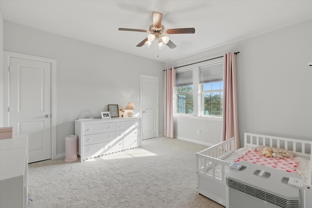 128 Brown Knight Ln, Lewisville, TX 75056 - carpeted bedroom with a ceiling fan and baseboards