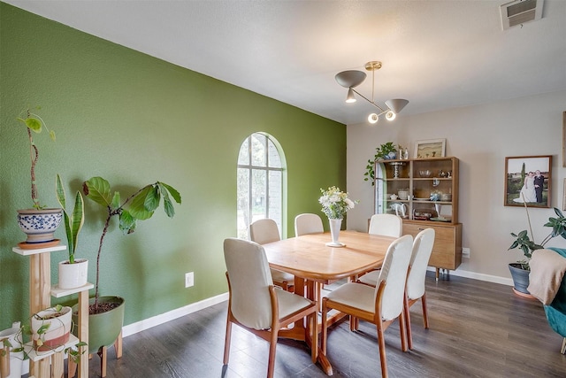 6325 Wallingford Dr, Fort Worth, TX 76133 - dining area featuring dark wood-style floors and baseboards