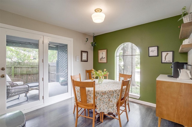 6325 Wallingford Dr, Fort Worth, TX 76133 - dining space with healthy amount of natural light, dark wood-type flooring, and baseboards