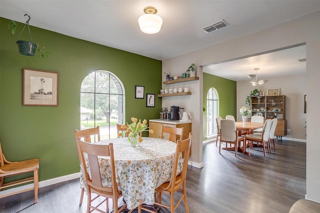 6325 Wallingford Dr, Fort Worth, TX 76133 - dining room featuring wood finished floors, a chandelier, and baseboards