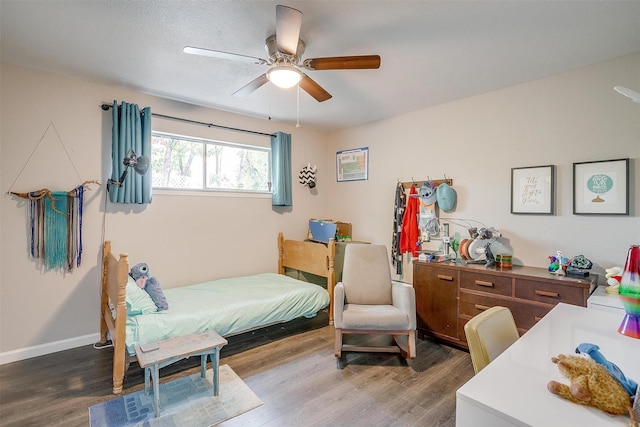 6325 Wallingford Dr, Fort Worth, TX 76133 - bedroom featuring wood finished floors, a ceiling fan, and baseboards
