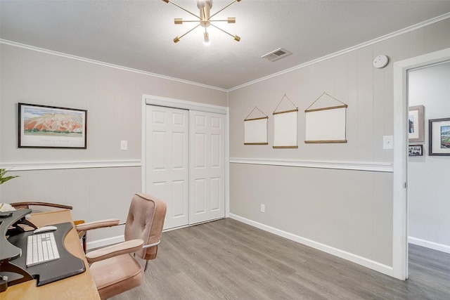 6325 Wallingford Dr, Fort Worth, TX 76133 - office with wood finished floors, a chandelier, ornamental molding, baseboards, and a textured ceiling