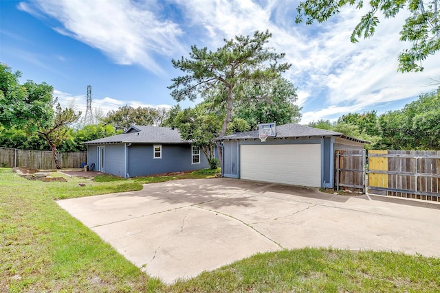 6325 Wallingford Dr, Fort Worth, TX 76133 - back of property with a gate and driveway