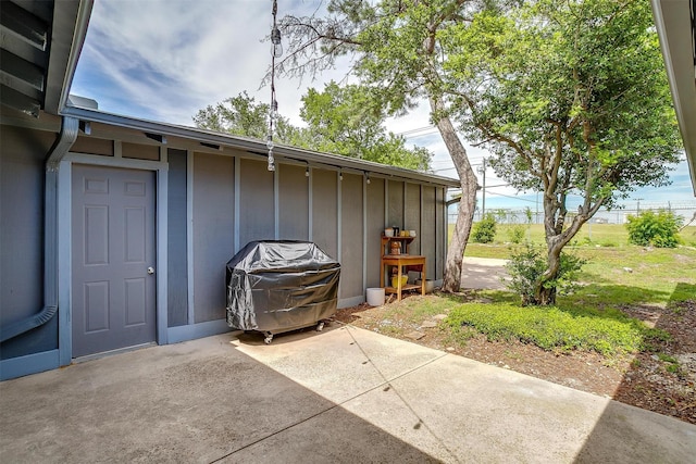 6325 Wallingford Dr, Fort Worth, TX 76133 - view of home's exterior featuring a patio area and board and batten siding