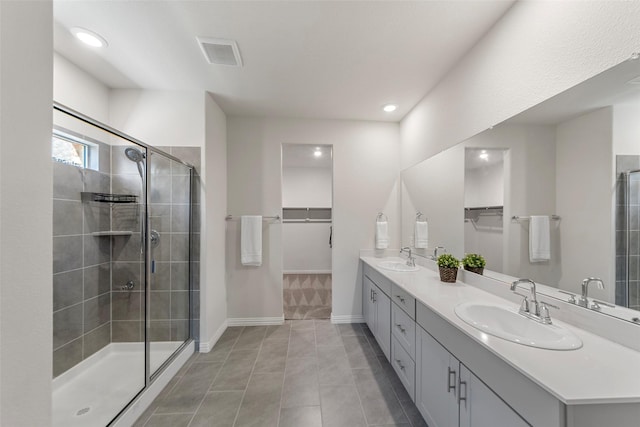 511 Rock Creek Dr, Princeton, TX 75407 - full bath featuring a spacious closet, double vanity, and a shower stall