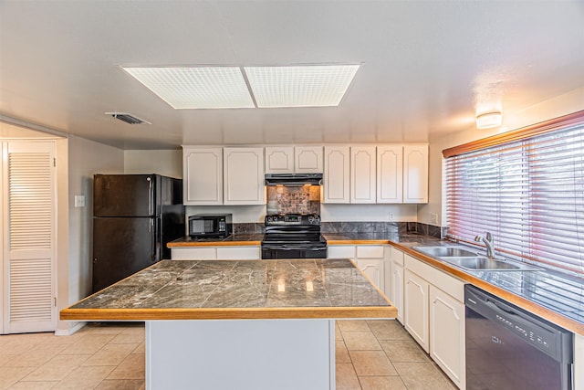 3626 Holly Tree Trl, Garland, TX 75044 - kitchen featuring black appliances, tile countertops, a sink, under cabinet range hood, and light tile patterned floors