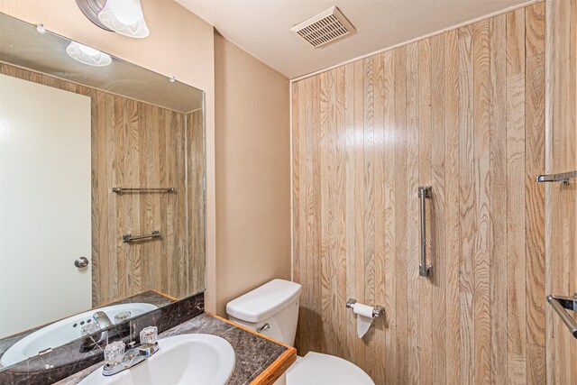 3626 Holly Tree Trl, Garland, TX 75044 - bathroom featuring vanity and toilet