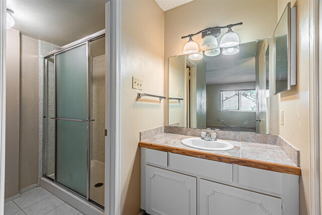 3626 Holly Tree Trl, Garland, TX 75044 - full bath with a stall shower, vanity, and tile patterned flooring