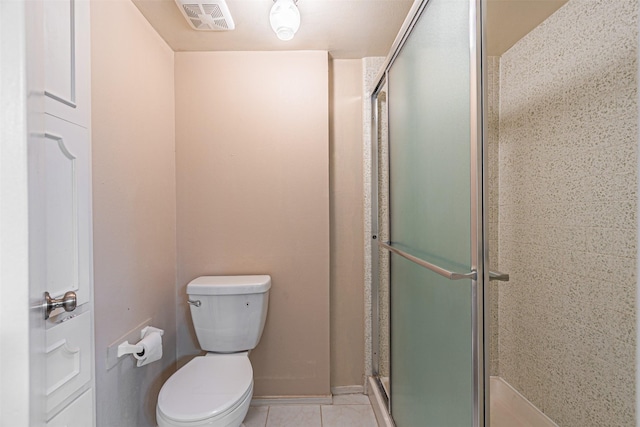 3626 Holly Tree Trl, Garland, TX 75044 - bathroom with toilet, a stall shower, tile patterned flooring, and baseboards