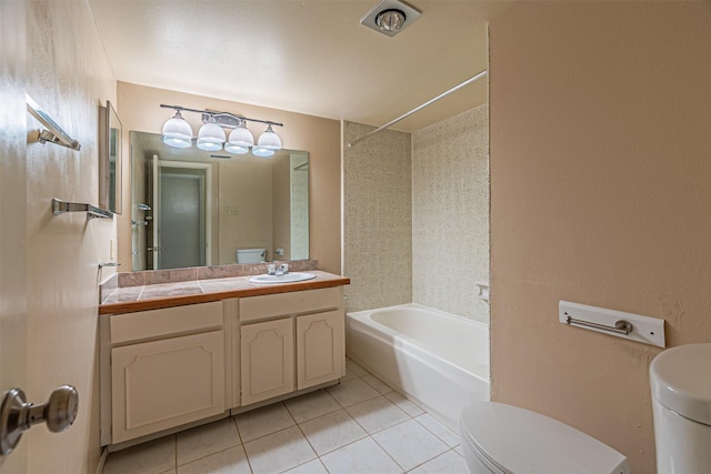 3626 Holly Tree Trl, Garland, TX 75044 - full bath featuring toilet, tile patterned flooring, tub / shower combination, and vanity