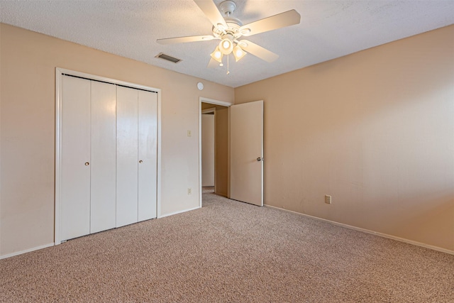 3626 Holly Tree Trl, Garland, TX 75044 - unfurnished bedroom with light carpet, a closet, baseboards, and ceiling fan
