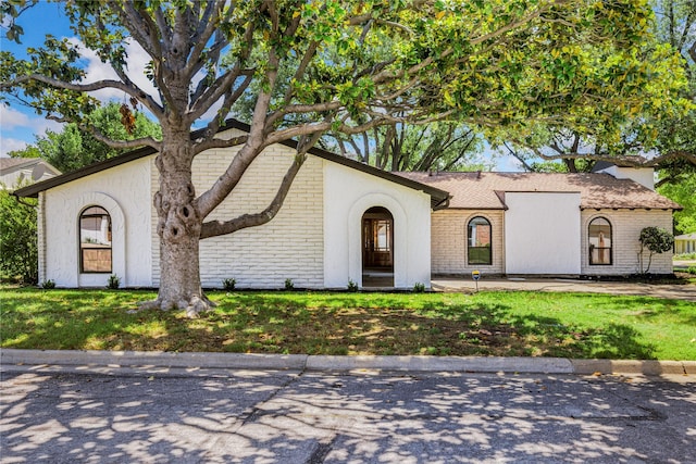 15616 Terrace Lawn Cir, Dallas, TX 75248 - view of front facade with a front lawn and brick siding