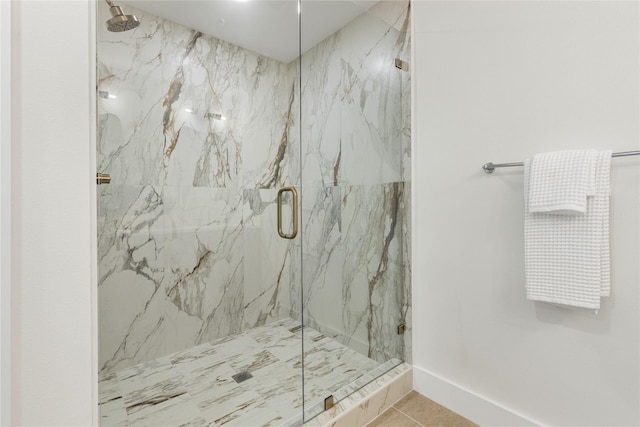 15616 Terrace Lawn Cir, Dallas, TX 75248 - full bath with a marble finish shower, baseboards, and tile patterned flooring