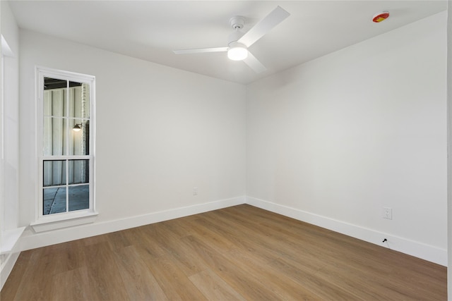 15616 Terrace Lawn Cir, Dallas, TX 75248 - empty room featuring wood finished floors, baseboards, and ceiling fan