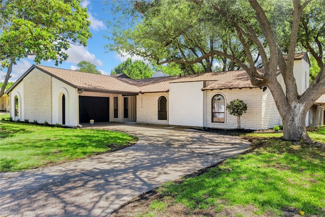 15616 Terrace Lawn Cir, Dallas, TX 75248 - view of front of property featuring brick siding, concrete driveway, a garage, and a front lawn