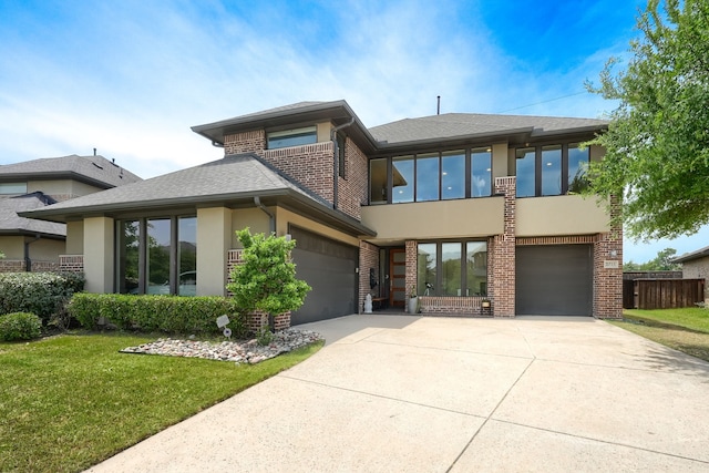 3711 Pistol Creek Dr, Frisco, TX 75034 - view of front facade featuring stucco siding, brick siding, concrete driveway, and roof with shingles