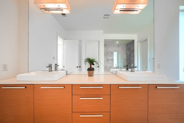 3711 Pistol Creek Dr, Frisco, TX 75034 - bathroom with double vanity and a stall shower