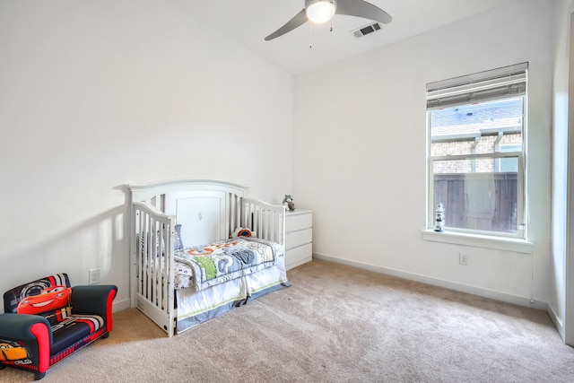 3711 Pistol Creek Dr, Frisco, TX 75034 - bedroom featuring carpet floors, baseboards, a crib, and a ceiling fan