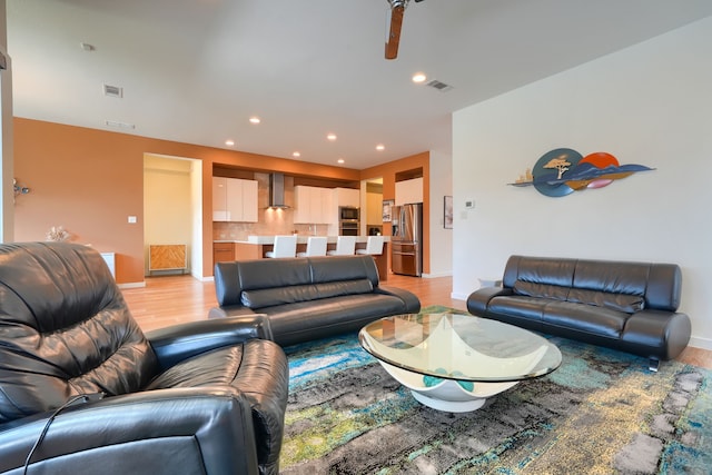 3711 Pistol Creek Dr, Frisco, TX 75034 - living area with light wood-type flooring, baseboards, and recessed lighting
