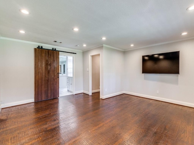 4432 Willow Ln, Dallas, TX 75244 - empty room featuring baseboards, a barn door, recessed lighting, crown molding, and dark wood finished floors