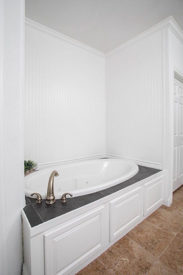 632 County Road 1952, Yantis, TX 75497 - full bathroom featuring a tub with jets and crown molding