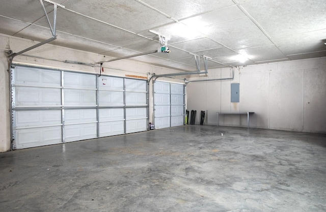 632 County Road 1952, Yantis, TX 75497 - garage featuring electric panel and a garage door opener