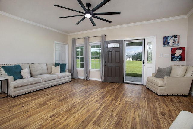 632 County Road 1952, Yantis, TX 75497 - living area with ornamental molding, wood finished floors, ceiling fan, and baseboards