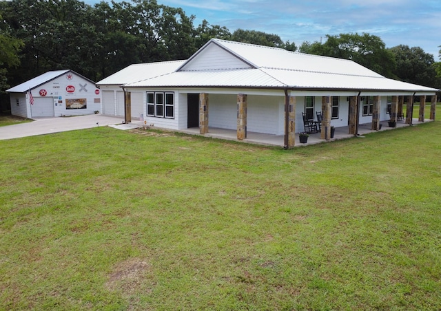 632 County Road 1952, Yantis, TX 75497 - country-style home with a porch, a front yard, driveway, and metal roof