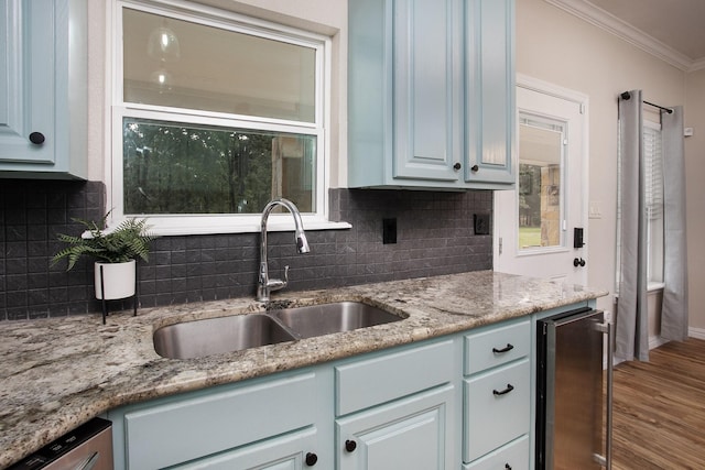 632 County Road 1952, Yantis, TX 75497 - kitchen with a sink, ornamental molding, wine cooler, backsplash, and dishwasher