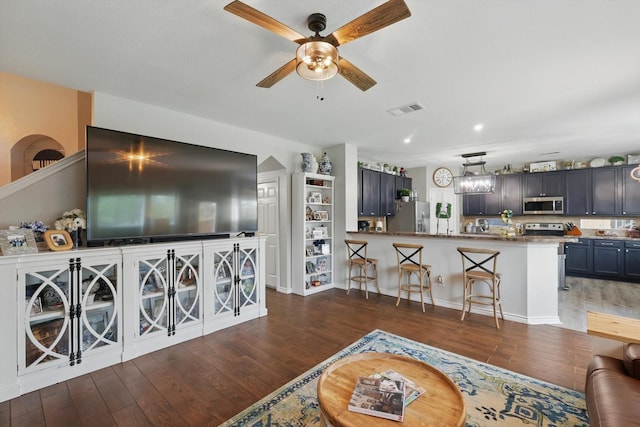 2304 Ranch House Dr, Denton, TX 76210 - living area featuring ceiling fan, wood finished floors, recessed lighting, and baseboards