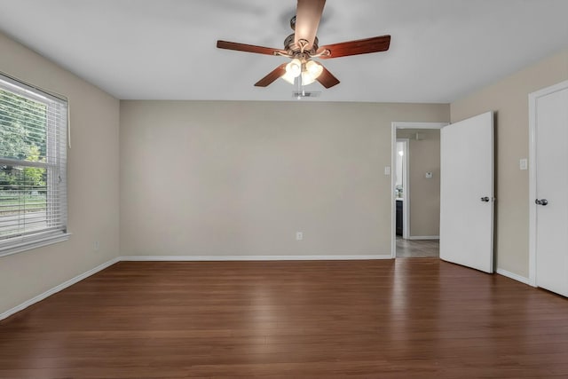 408 Texas Ave, Hewitt, TX 76643 - unfurnished room with wood finished floors, a ceiling fan, and baseboards
