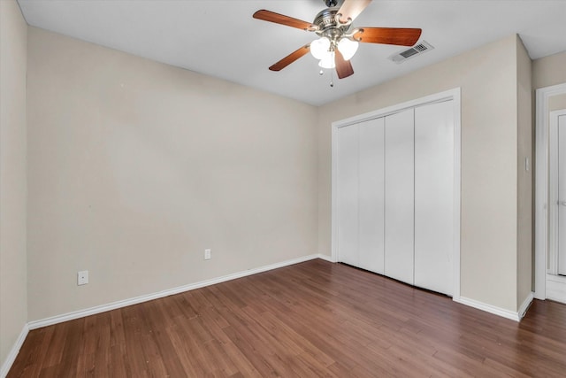408 Texas Ave, Hewitt, TX 76643 - unfurnished bedroom with wood finished floors, baseboards, a closet, and ceiling fan