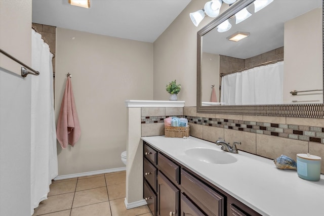 408 Texas Ave, Hewitt, TX 76643 - full bathroom with vanity, tasteful backsplash, toilet, tile patterned floors, and baseboards