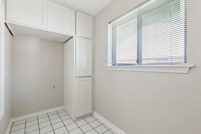 4406 Cobblers Ln, Dallas, TX 75287 - washroom featuring plenty of natural light, baseboards, and light tile patterned flooring
